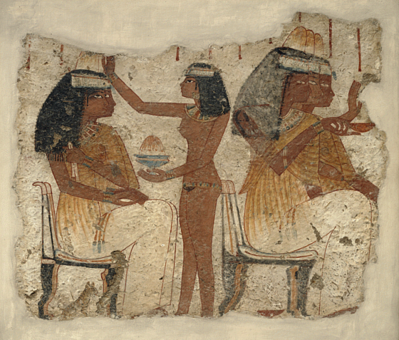 <em>Vignette of figures, with so-called funerary cones on their heads, attending a banquet from an as yet to be identified Theban tombs.</em>